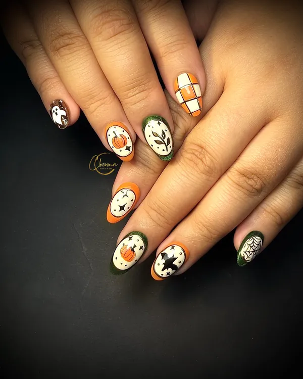 Almond nails with pumpkins, bats, a ghost, spider web and orange and green checks